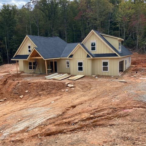 New house fully sided and awaiting its finish coat